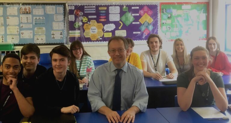 Spetisbury Construction Finance Director, Richard Barker, with students at Twynham School