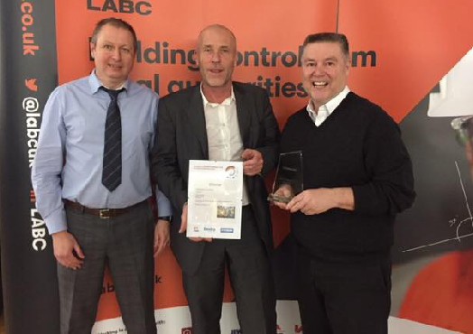 Spetisbury Construction holding LABC awards certificate