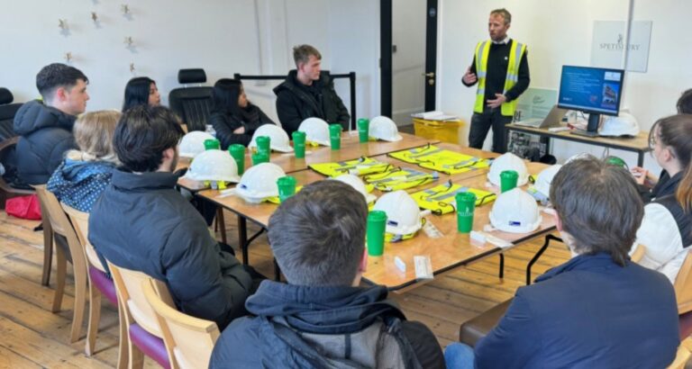 Spetisbury Construction team member teaching architectural students in a classroom